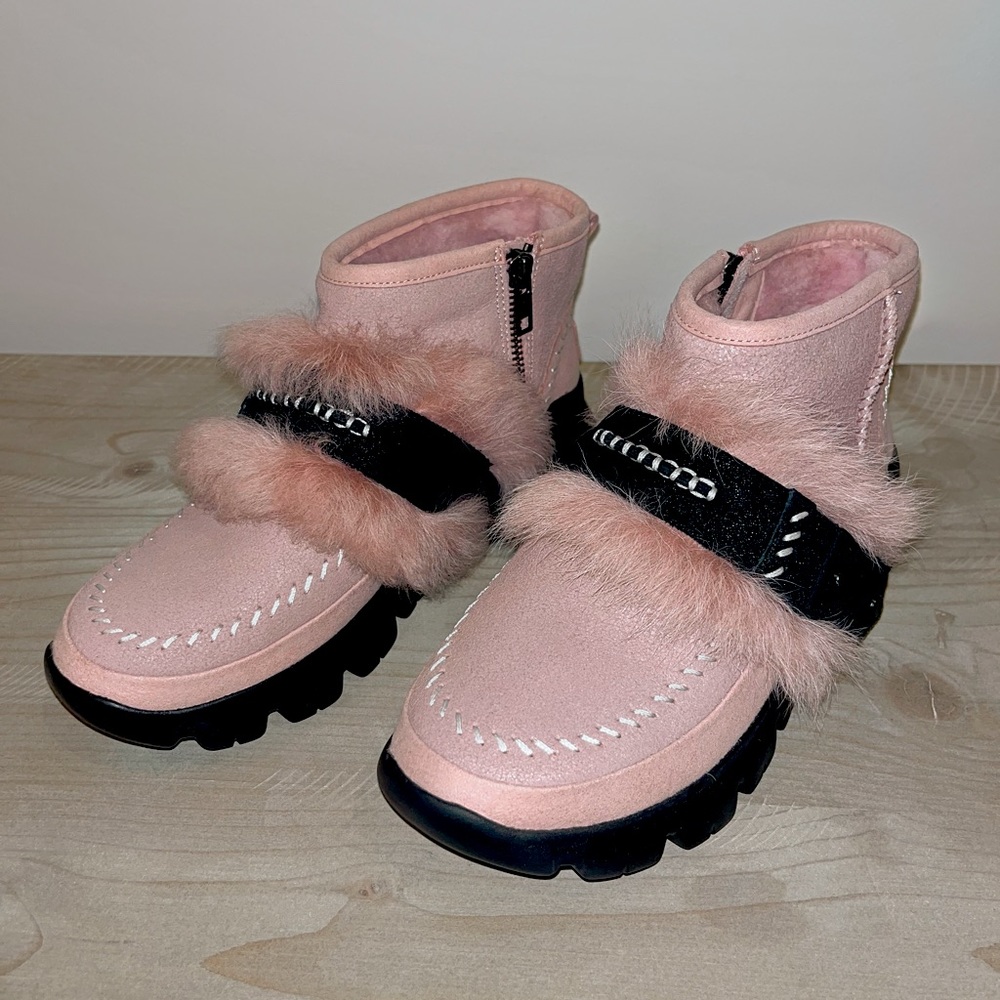 Never worn! Pink UGG boots with fluffy faux fur adornment